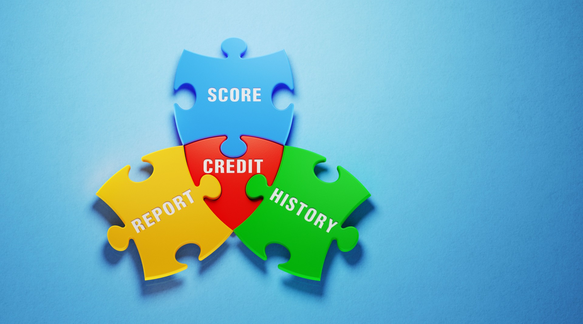 Credit Score Concept - Colorful Jigsaw Puzzle Pieces On Blue Background